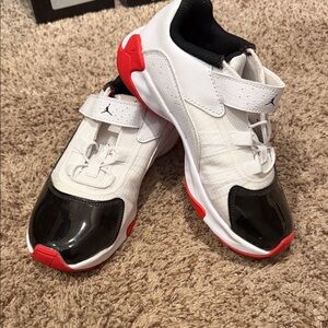 Jordan Kids White, Black, and Red Sneakers
